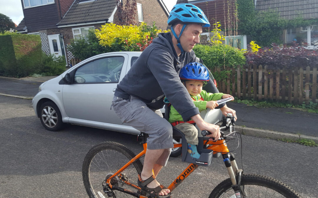 Child bike seat on a mountain bike